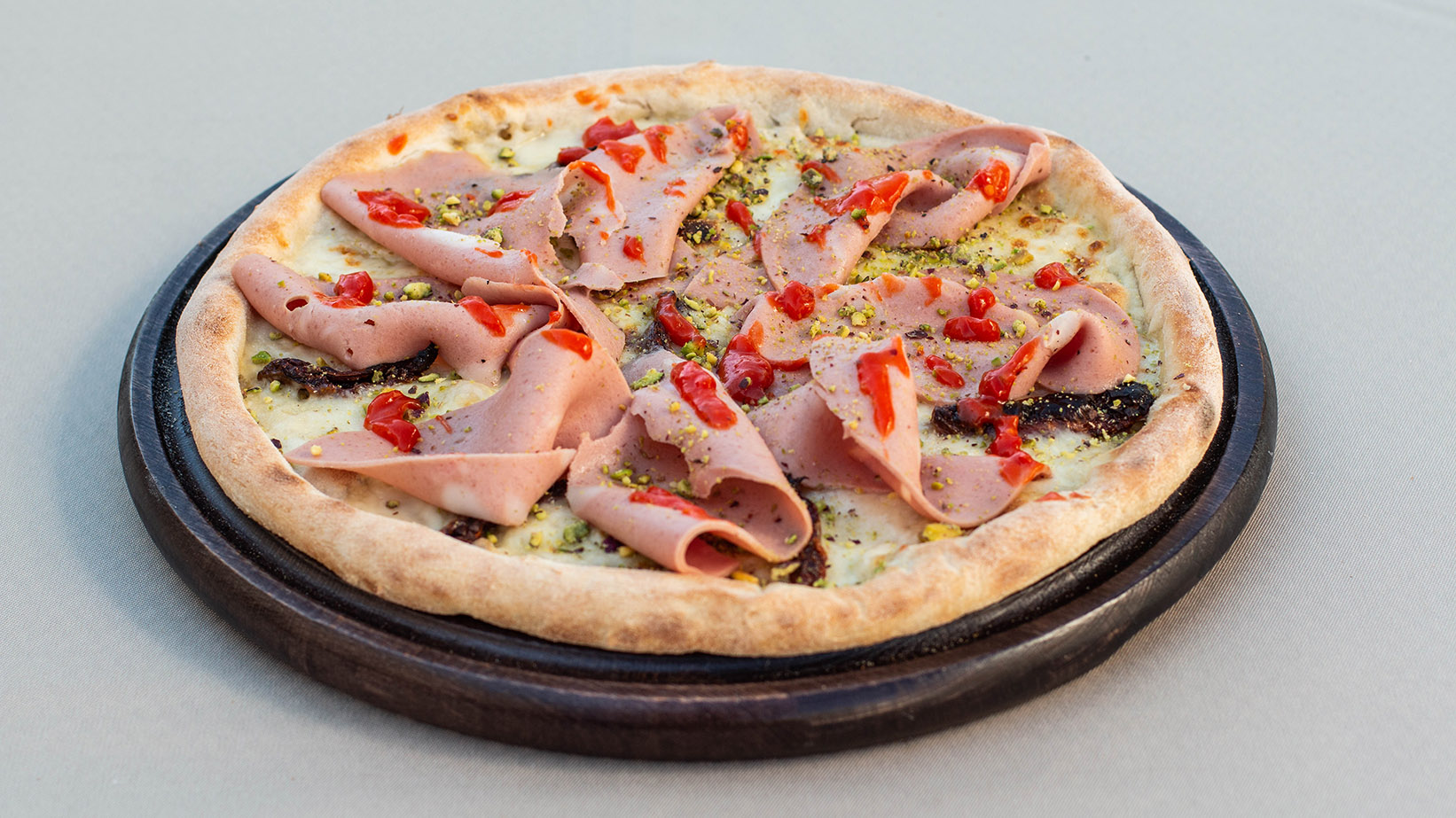 “Pizza mortadella e pistachio”